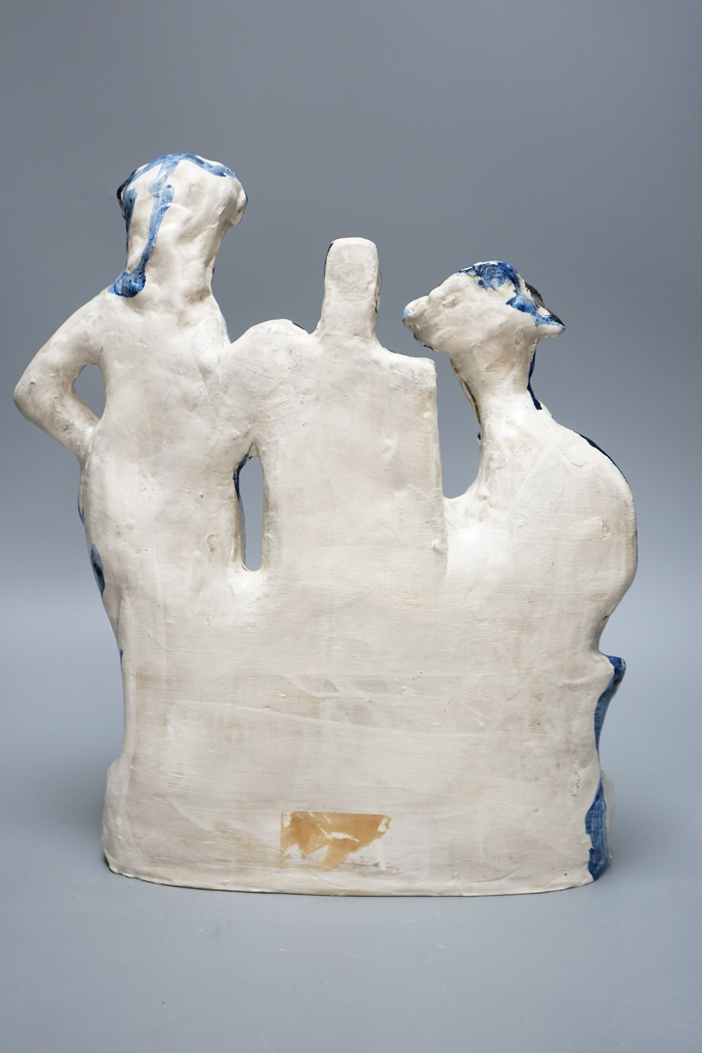 After Picasso, a tin-glazed blue and white figural studio pottery group of an artist and their muse, 37cm tall